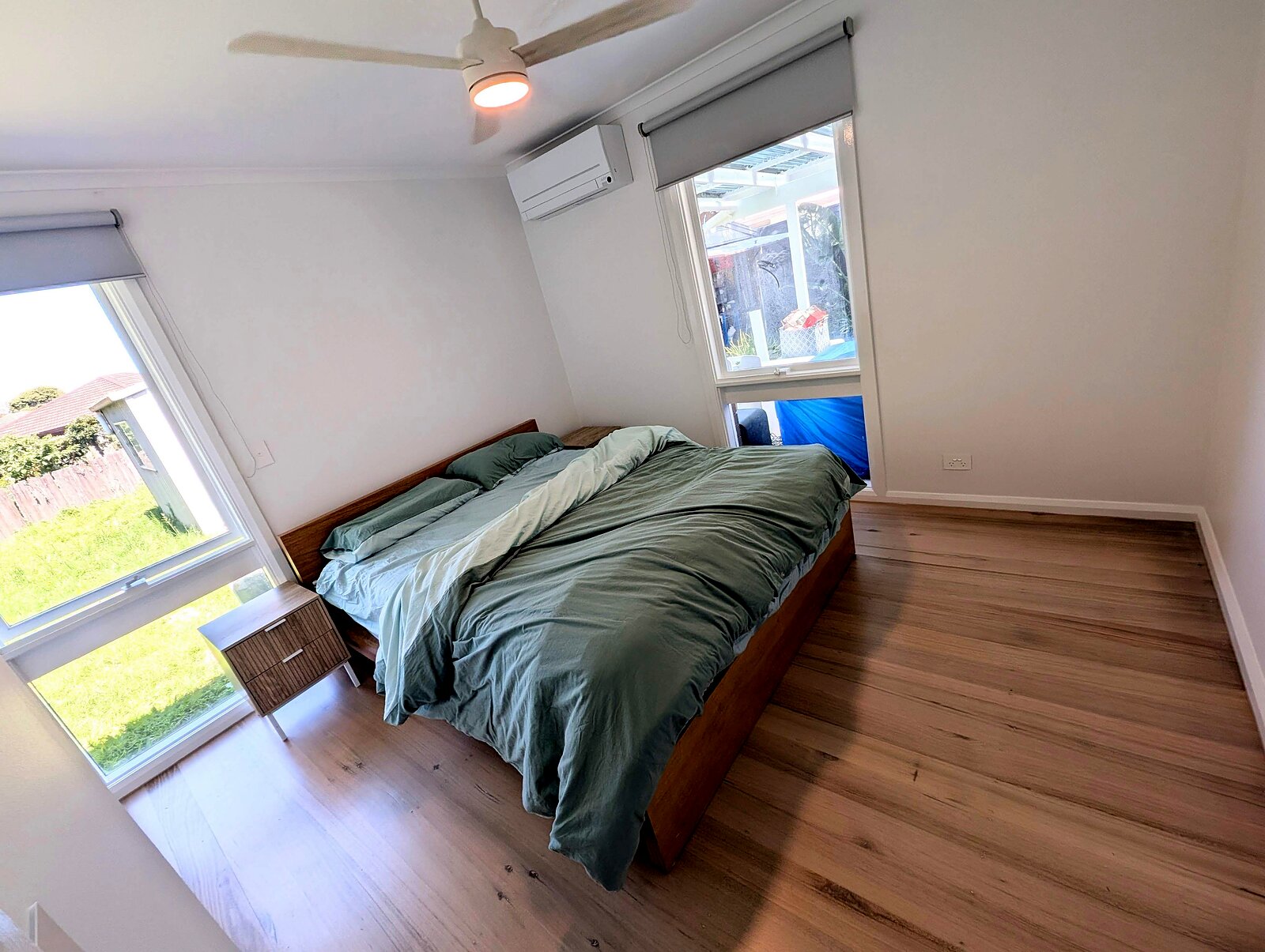 Ceiling fan with light fitted in a bedroom