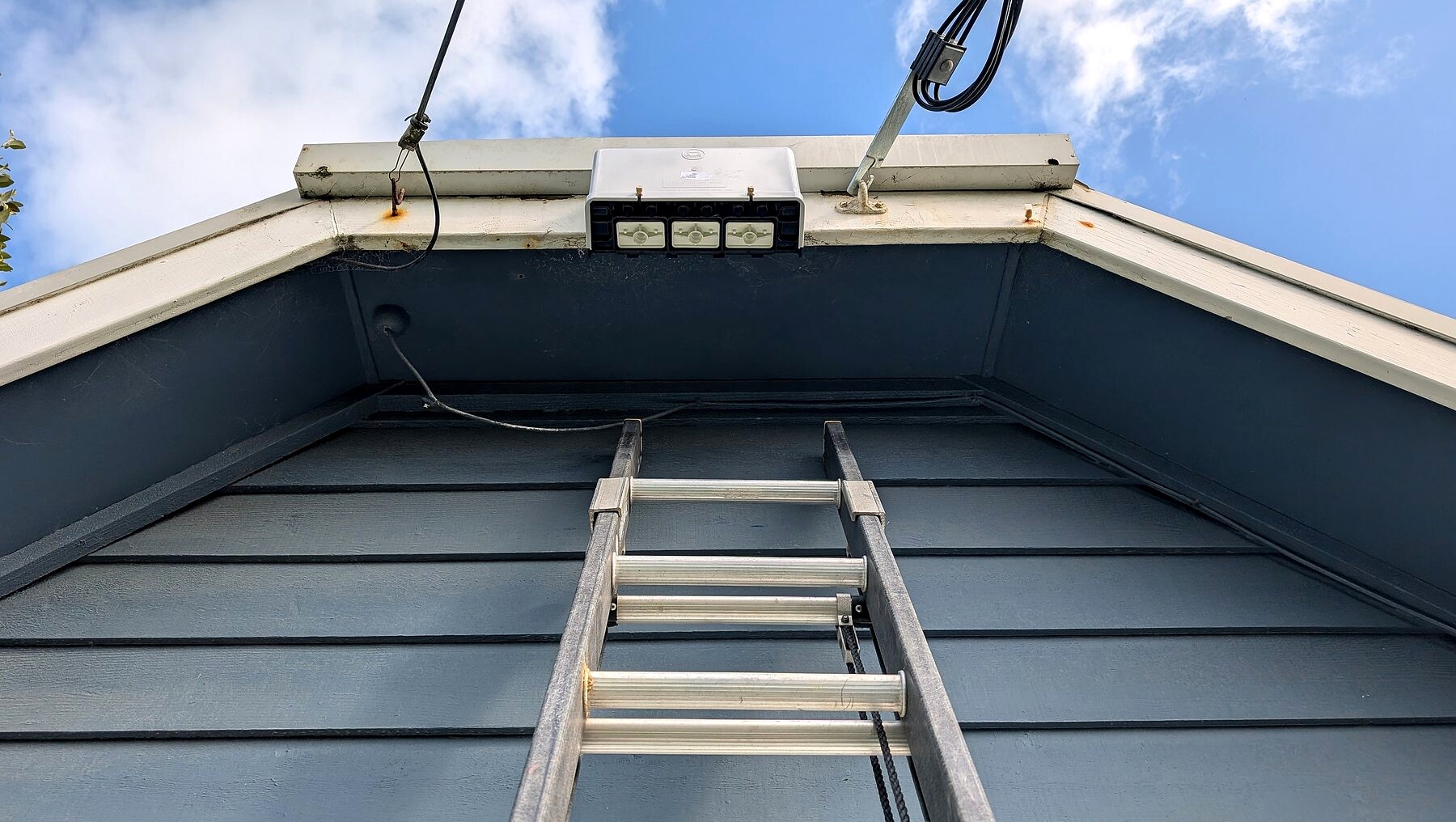 New point of attachment on a gable, with a ladder against the wall